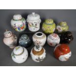A collection of ginger jars, predominantly with covers,