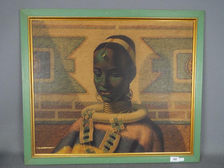 A framed print after Vladimir Tretchikoff, Lady Of Ndebele, labeled verso,