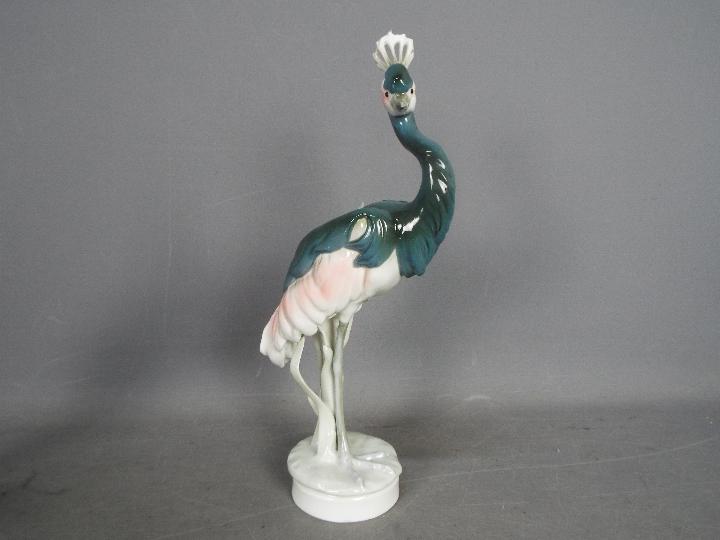 Royal Dux - Two bird figurines comprising a feeding heron and a peahen (one leg detached but - Image 7 of 11