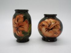 Moorcroft - Two Moorcroft Pottery miniature vases, decorated with hibiscus, largest approximately 5.