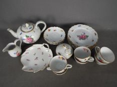 A Hutschenreuther tea service with floral decoration and a Meissen leaf form dish decorated with