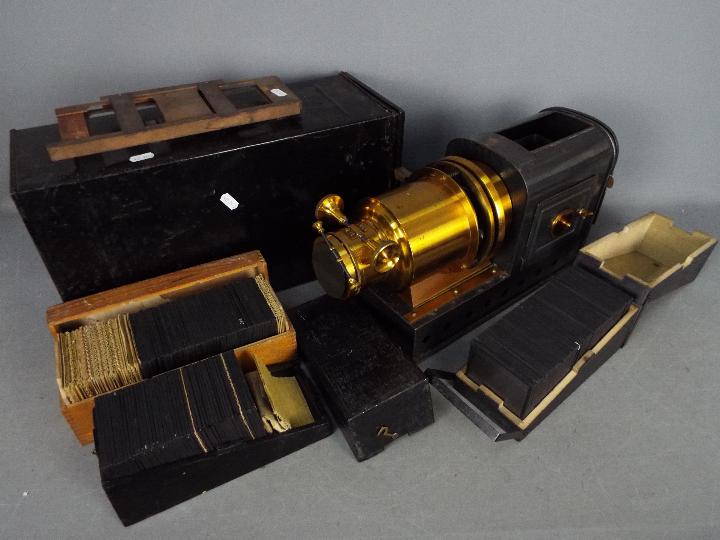 A late 19th century magic lantern, the lamp marked Stock Patent,