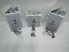 Lladro - Three Cat figures(boxed). Blue factory marks and impressed numbers. Tallest is 14cm high.