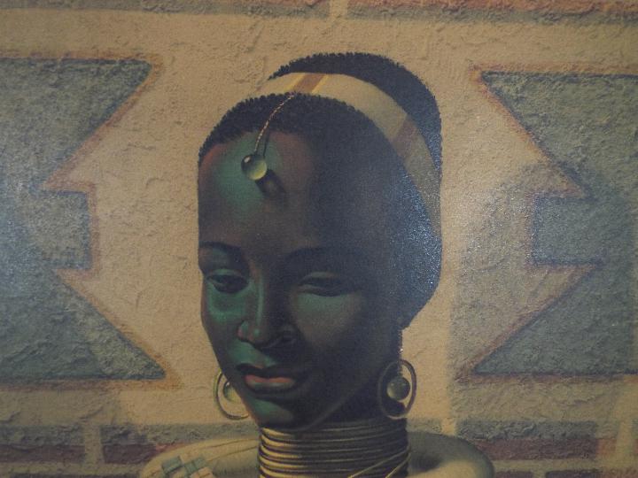 A framed print after Vladimir Tretchikoff, Lady Of Ndebele, labeled verso, - Image 3 of 5