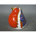 Royal Crown Derby - a paperweight depicting a Robin with gold stopper,