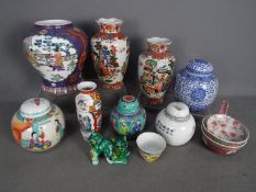 A group of ceramics to include vases, ginger jars and similar.