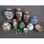 A group of ceramics to include vases, ginger jars and similar.