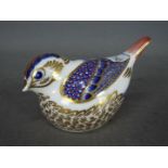 Royal Crown Derby - a paperweight depicting an Imari goldcrest with gold stopper,