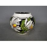 Moorcroft - a ceramic Moorcroft vase decorated in the Phoebe pattern,