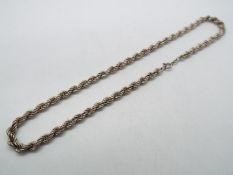 Silver - a silver rope chain,