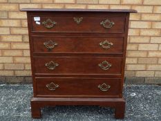 A small chest of four drawers, approximately 76 cm x 70 cm x 46 cm.