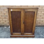 A small twin door cupboard, approximately 86 cm x 72 cm x 35 cm.