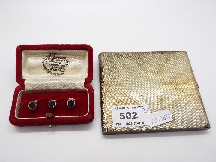 A George V silver cigarette case with engine turned decoration, London assay 1933,