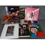 A collection of 12" and 7" vinyl records to include Motown, Erasure, Wham, Deacon Blue,