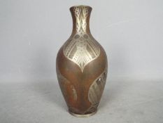 A small WMF vase, approximately 20 cm (h).