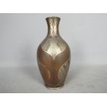 A small WMF vase, approximately 20 cm (h).