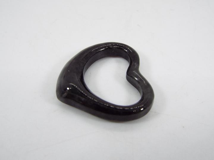 A 10 ct Type A Black Jadeite 'Heart of the Hwe' pendant issued in a limited edition 1 of 484, - Image 2 of 5