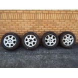 A set of four 16" Mercedes wheels with tyres (225/60R16).