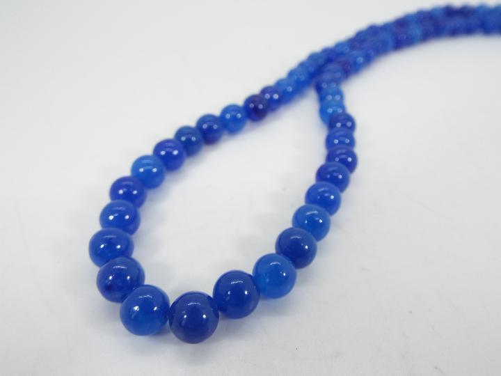 A 147 ct Blue Jade Slider Necklace set with silver issued in a limited edition 1 of 50, - Image 3 of 6
