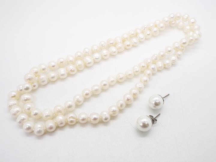 A Kaori Cultured Pearl Sterling Silver set of Necklace and Earrings,