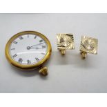 A vintage white and yellow metal pocket watch, Roman numerals to a white enamel dial,