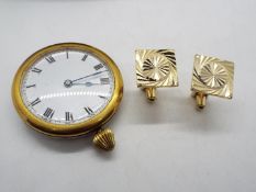 A vintage white and yellow metal pocket watch, Roman numerals to a white enamel dial,