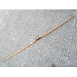 Archery - A vintage wooden bow by Slazenger,