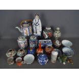 A mixed lot of Oriental and similar ceramics to include ginger jars, bowls, teapot,