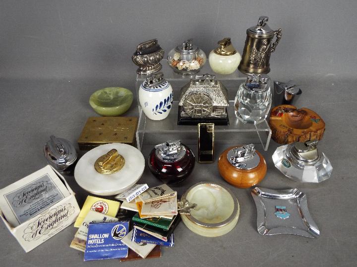 Tobacciana - a collection of vintage cigarette lighters to include Ronson, Delft, Onyx,