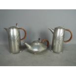 Archibald Knox for Liberty & Co - Three pieces of Tudric comprising coffee pot,