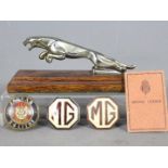 Automobilia - A Jaguar car mascot mounted to wooden plinth, 19.
