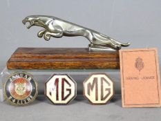 Automobilia - A Jaguar car mascot mounted to wooden plinth, 19.