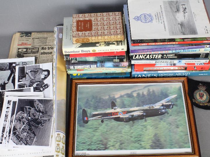 A collection of publications, predominantly relating to aircraft, RAF Bomber Command patch,