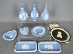 A collection of Wedgwood Jasperware to include The Guinness 225th Anniversary Plate with
