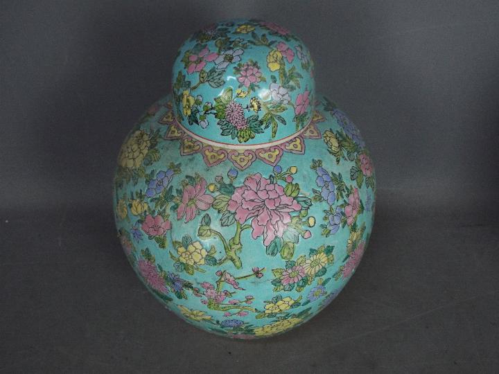 A large ginger jar and cover with floral decoration against a turquoise ground, - Image 3 of 11