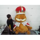 An extremely large Garfield plush soft toy,