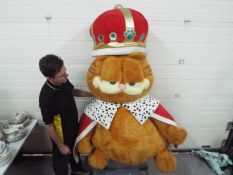 An extremely large Garfield plush soft toy,