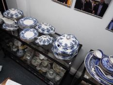 A collection of blue and white dinner wares, plates, tureens and similar, in excess of 50 pieces.