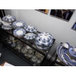 A collection of blue and white dinner wares, plates, tureens and similar, in excess of 50 pieces.