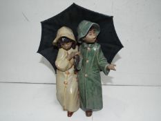 Lladro - Umbrella Girl and boy. High 25cm.
