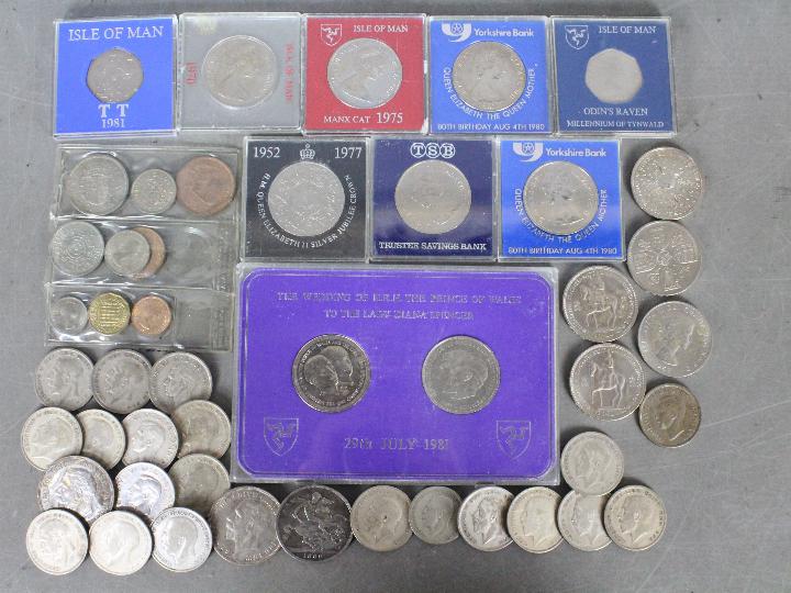 A collection of commemorative crowns and coins including silver content examples including one