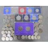 A collection of commemorative crowns and coins including silver content examples including one