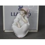 Lladro - A boxed figurine entitled Just Resting, # 6481, approximately 16 cm (h).