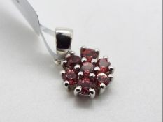 A 0.97ct Nampula Garnet set in a Silver pendant, issued in a limited edition 1 of 288, size 1.