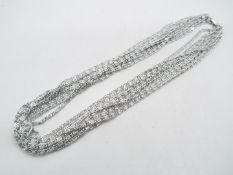 A Sarah Coventry multi strand, white metal designer necklace, stamped Sarah Cov to the clasp,
