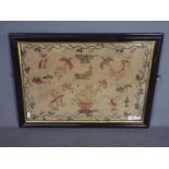 An early 19th century needlework sampler incorporating biblical verse, birds and butterflies,