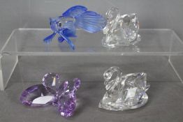 Swarovski - Four unboxed crystal animals comprising two swans,