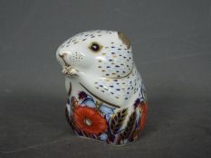 Royal Crown Derby - a paperweight entitled Poppy House with gold stopper,