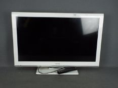 A Toshiba 32" LCD television / DVD player, model 32DL934B.