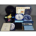 A collection of boxed items by Royal Worcester, Wedgwood, Royal Doulton to include plates,